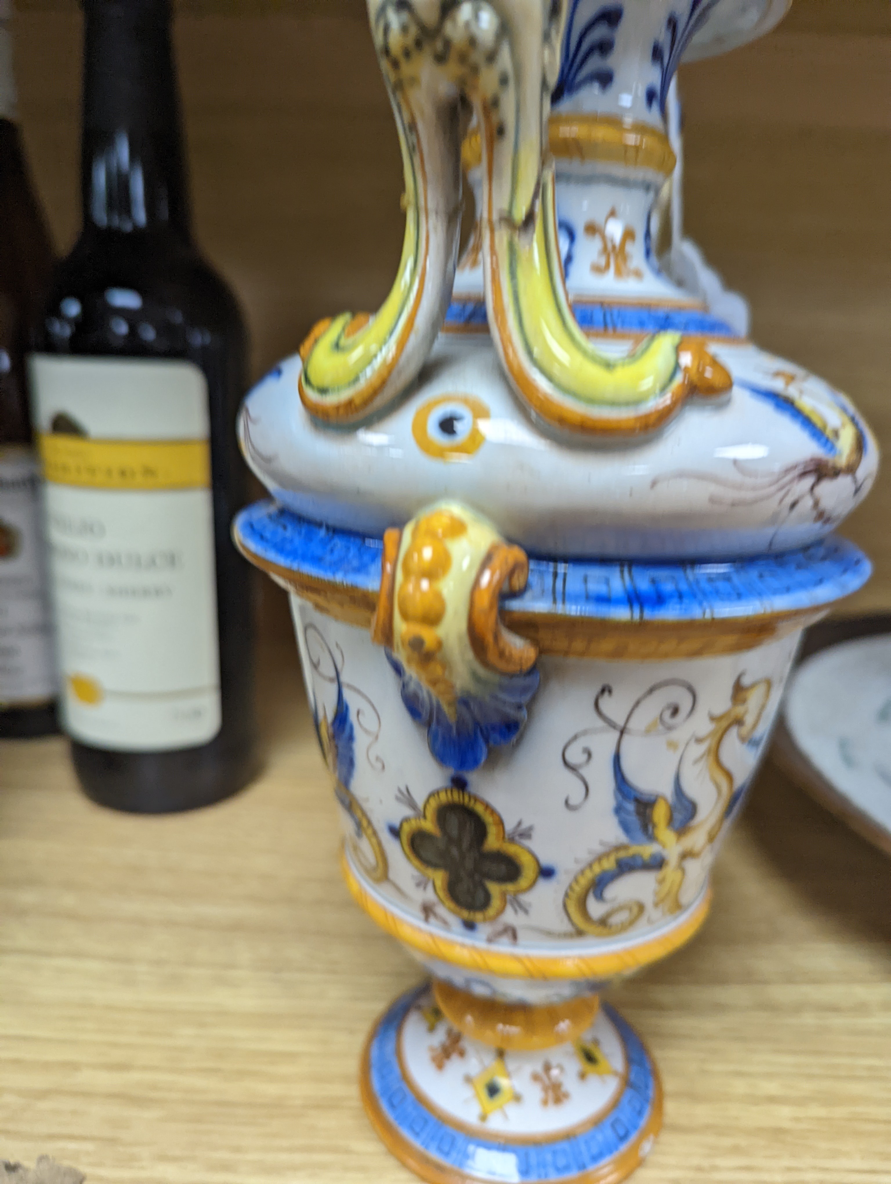 A Ginori maiolica two handled vase and Delft polychrome double cylinder teapot 27cm